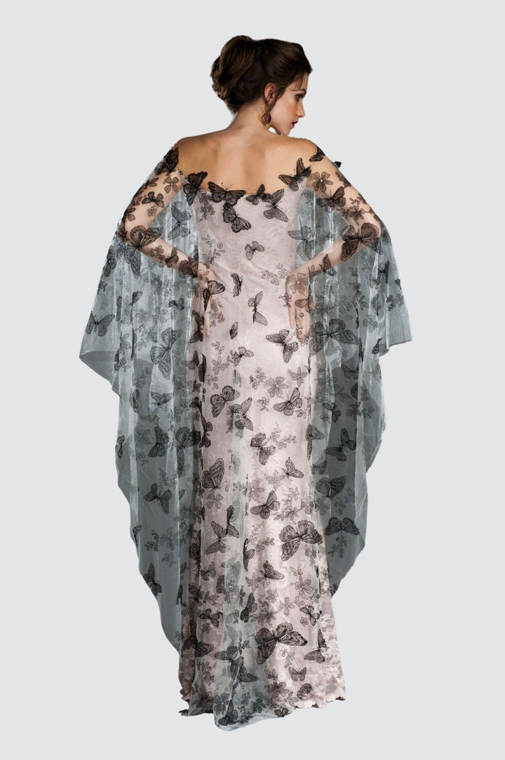 Robe de cocktail asymétrique en dentelle et franges