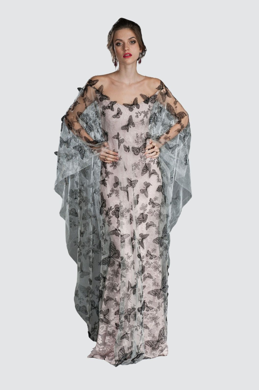 Robe de cocktail asymétrique en dentelle et franges