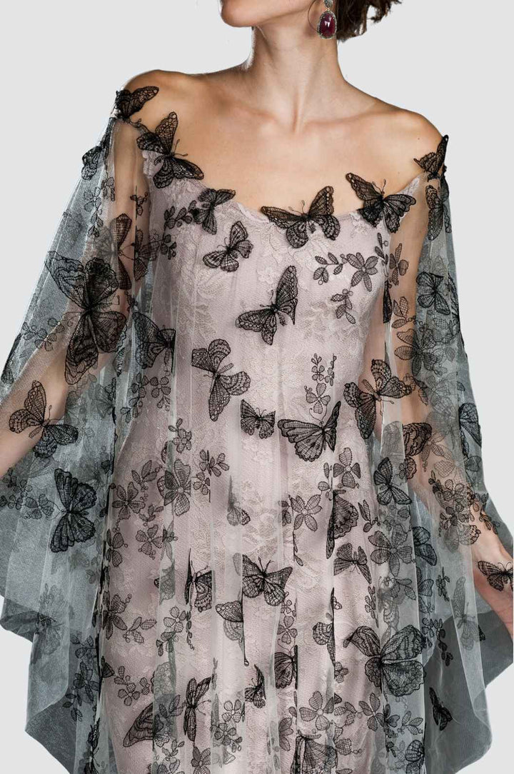 Robe de cocktail asymétrique en dentelle et franges