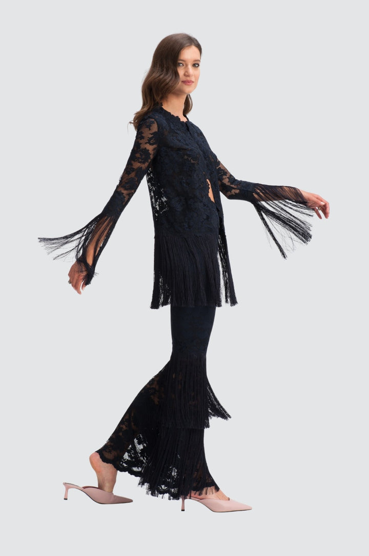 Pantalon en dentelle avec extrémités à franges