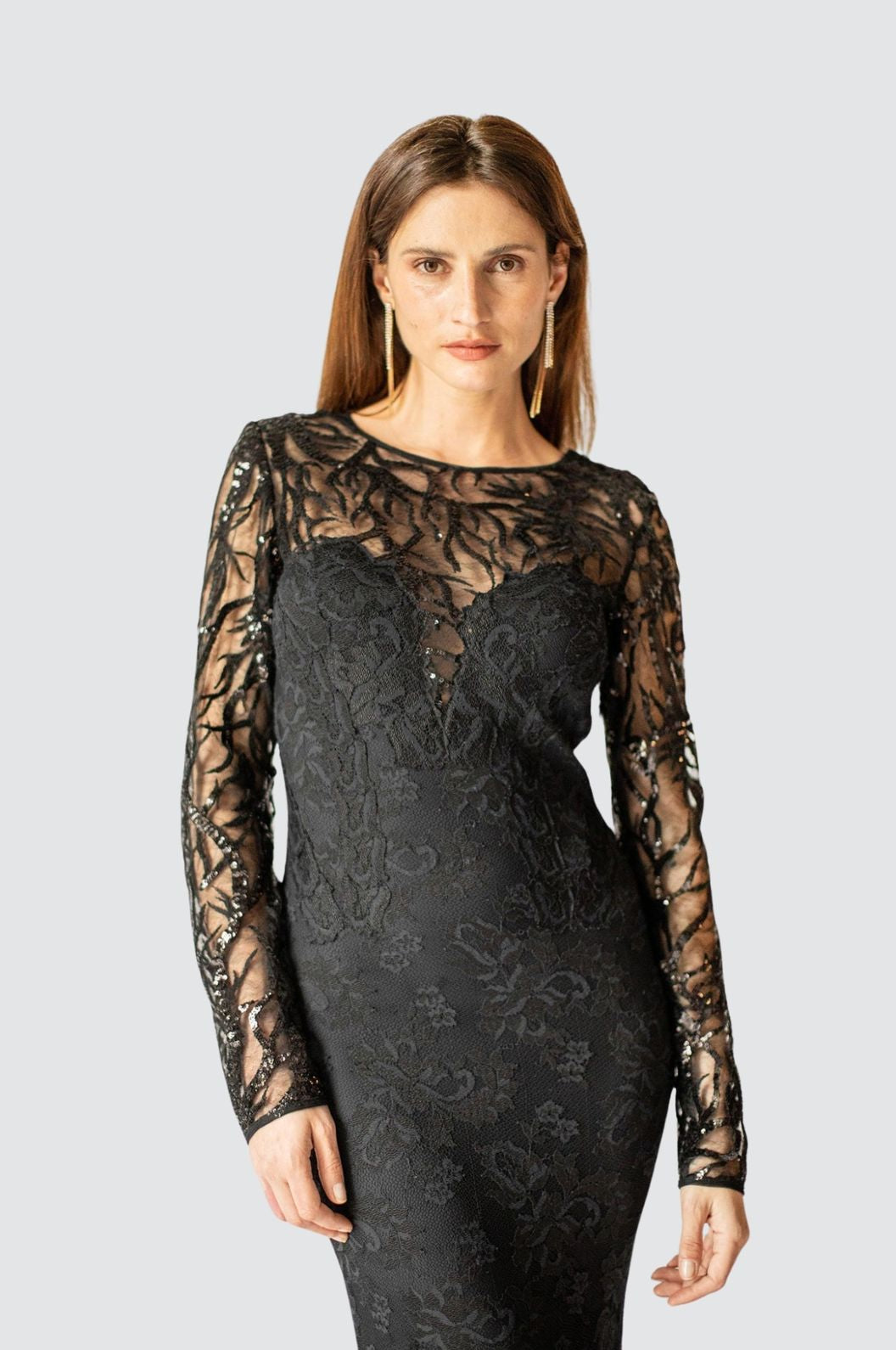 noir mermaid dress Noir Ruffled High-Neck Mermaid Gown A dramatic expression of modern couture, this noir gown commands attention through its sculptural volume and sleek, contoured base. The fitted mermaid silhouette elongates and defines the